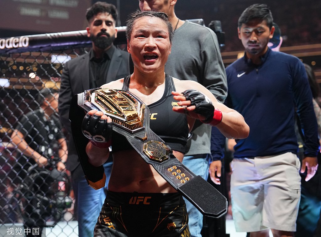 张伟丽成功卫冕金腰带，创造UFC女子最大打击分差纪录|张伟丽|UFC|莱莫斯_新浪新闻