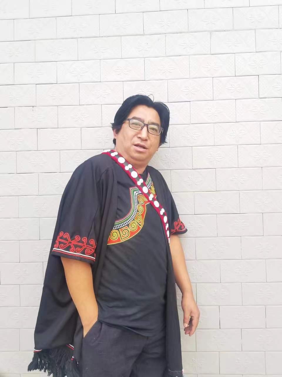 c视频丨大凉山音乐学者俄木沙马:传承和发展彝族古老