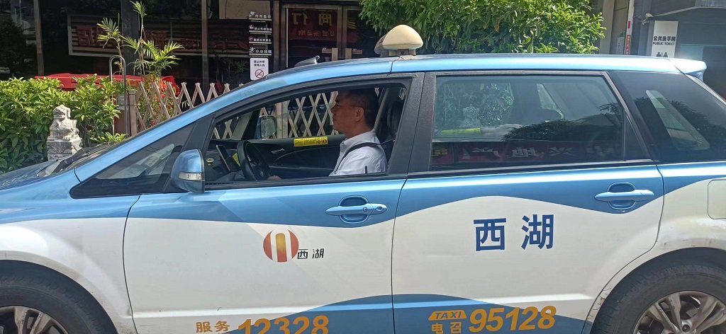 西湖中南公司出租车驾驶员王吉昌.