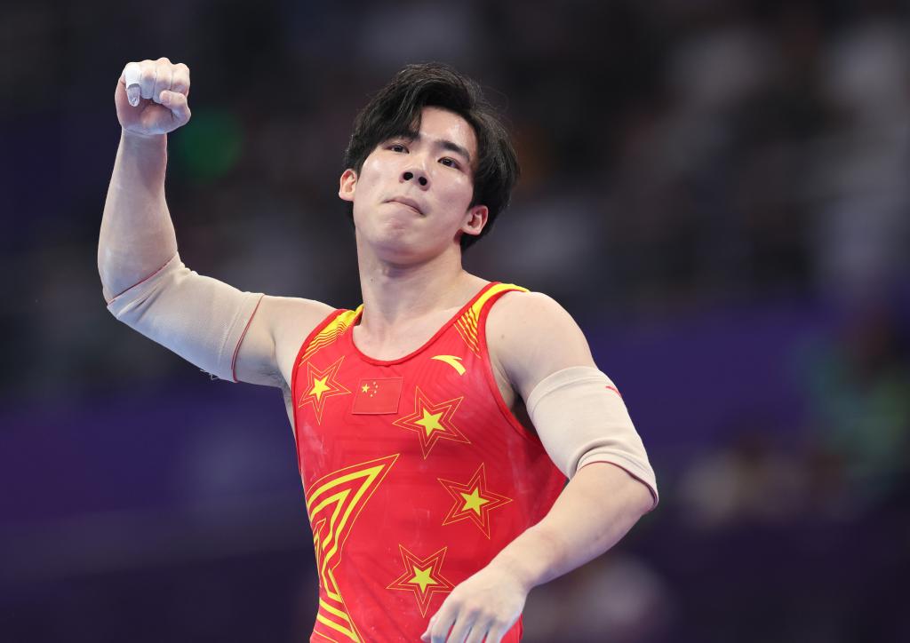 9月26日,张博恒在比赛后庆祝.新华社记者 程婷婷 摄