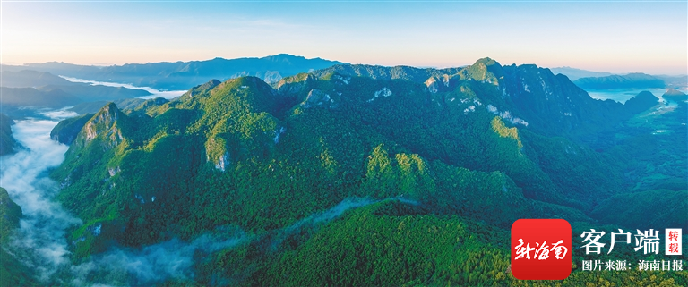图为俄贤岭的山脊绵延至大广坝水库.海南日报记者 李天平 摄
