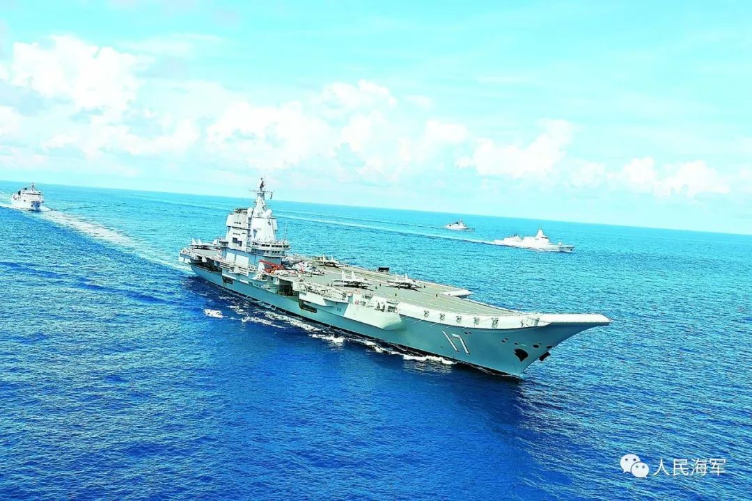 舰"经中央军委批准在海南三亚某军港交付海军自主建造的国产航空母舰