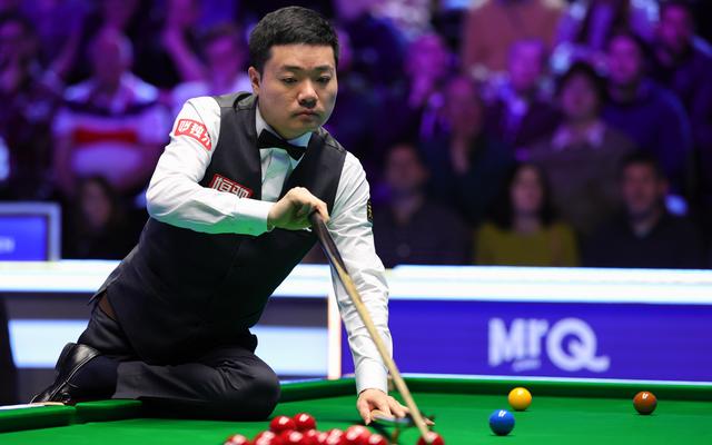 丁俊晖抱恙出战,最终晋级次轮. 图/新华社