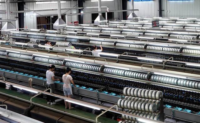 四川新丝路茧丝绸有限公司生产车间.(资料图)
