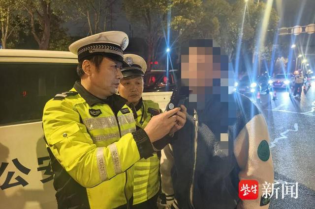 图为张某酒驾被查
