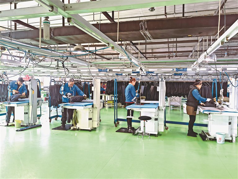 海伦"三特服装"抢赶订单|日本_新浪财经_新浪网