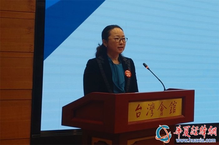 大会现场发布了以"联系,团结,凝聚"为主题的logo及队旗,市台联副会长