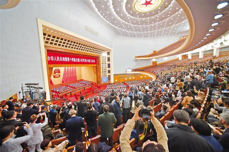 图为3月11日下午,十四届全国人大二次会议在北京人民大会堂举行闭幕会