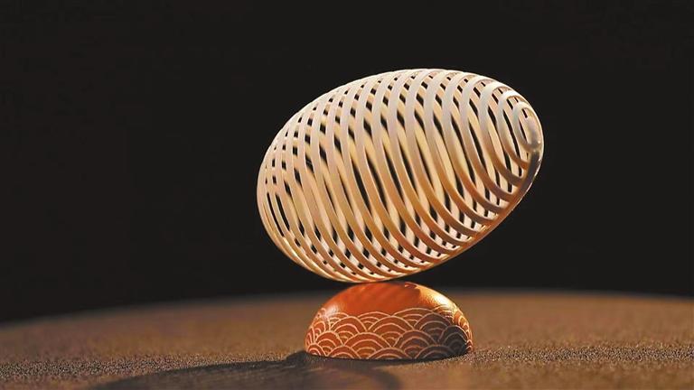 光波复刻马家窑彩陶杨星国在制作蛋雕作品鹅蛋《牡丹百福》掐丝珐琅