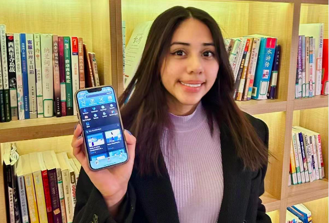 （图 | 萨尔瓦多女孩詹妮弗推荐来华朋友用支付宝）