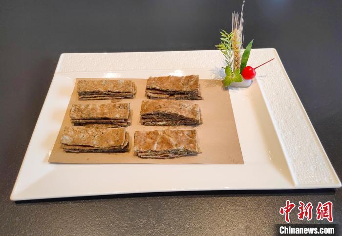 2月26日，长沙一家餐馆上新的香椿煎蛋。　中新社记者 唐小晴 摄