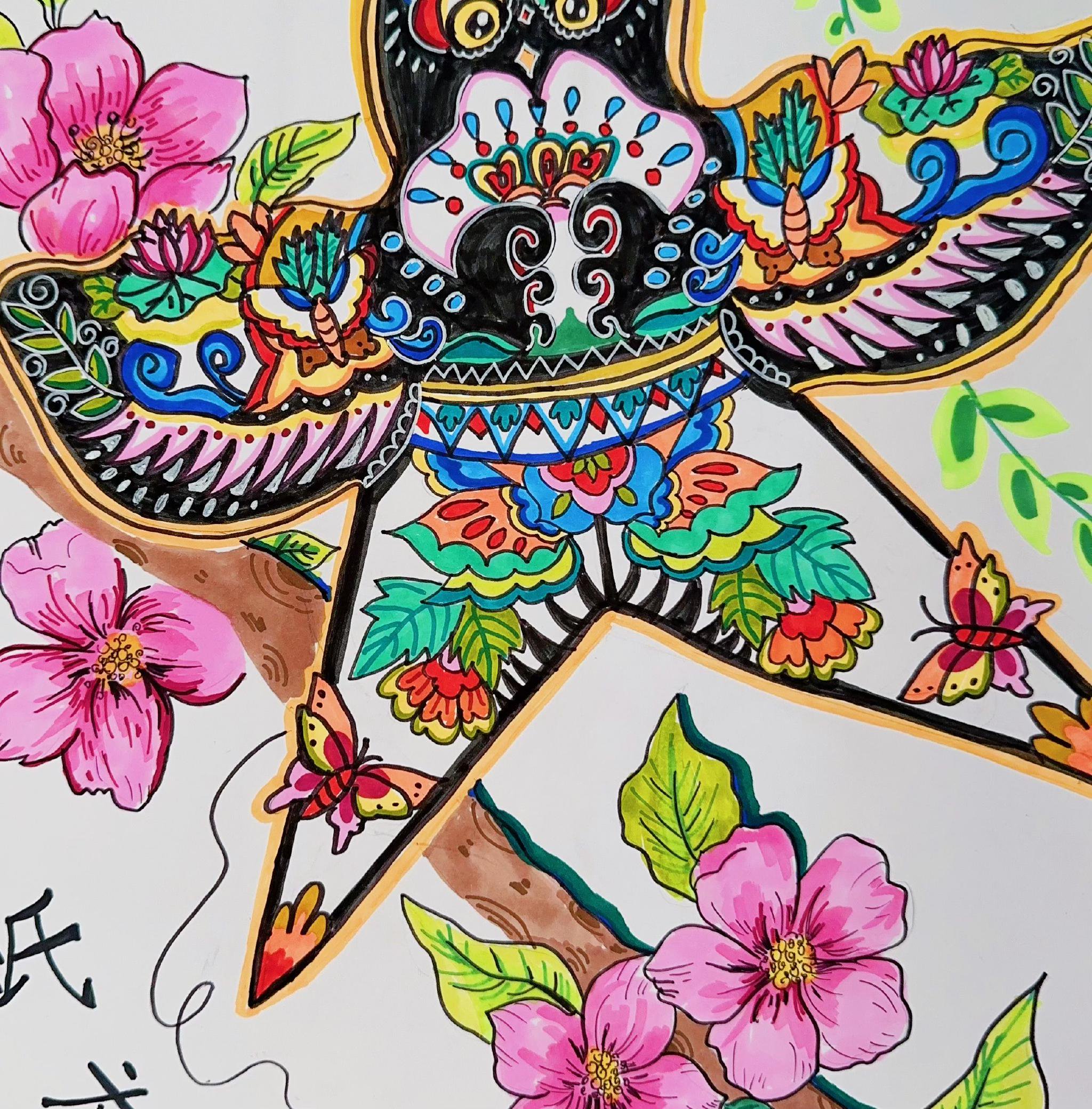 用灵巧的双手绘制出一幅幅色彩斑斓,充满创意的风筝图案