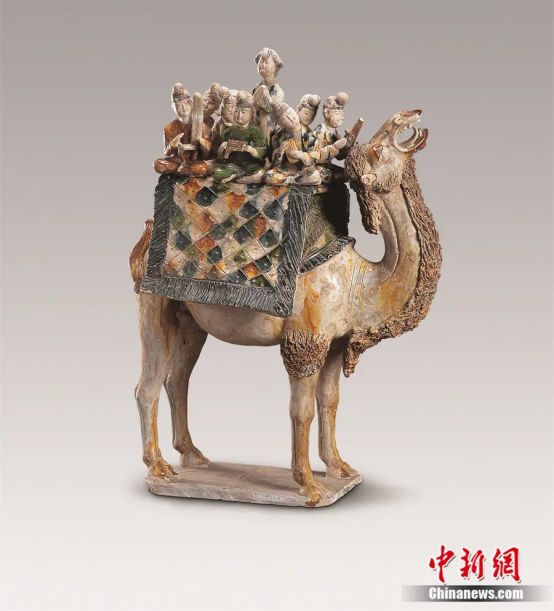 图为三彩骆驼载乐俑.来源:陕西历史博物馆