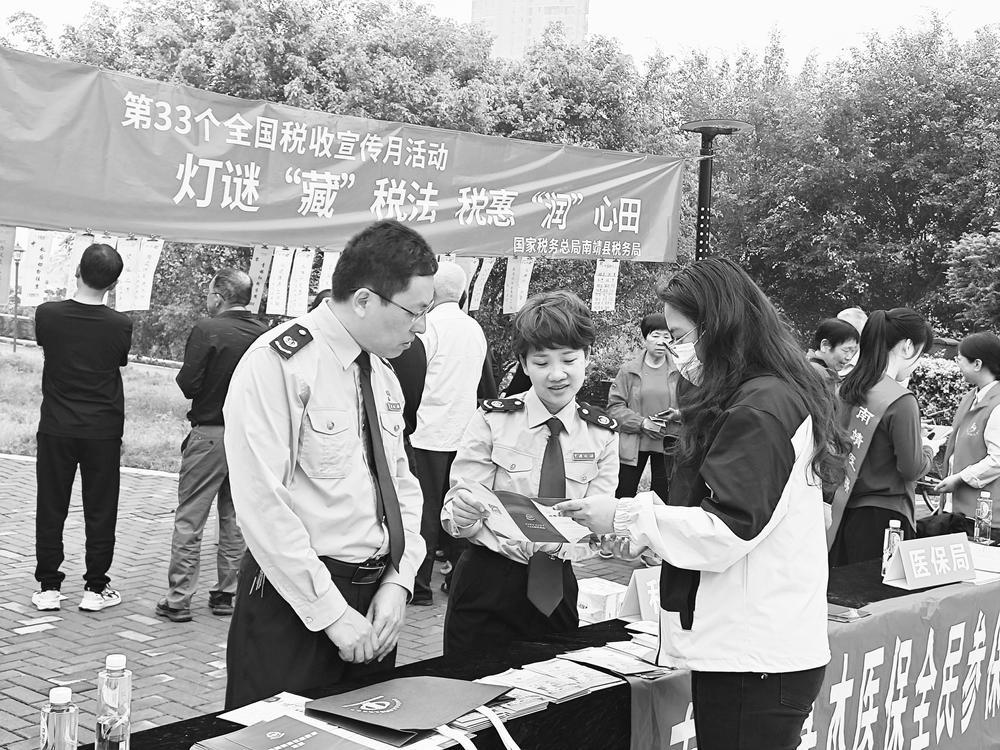 南靖县税务局开展"灯谜藏税法税惠润心田"税收灯谜宣传活动|税务
