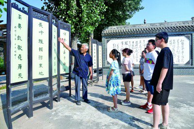     寺底村的孩子们在传统文化的浸润中成长。温徐旺摄/光明图片