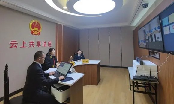 铜梁法院云上共享法庭正在开庭。中国电信重庆公司供图 华龙网发