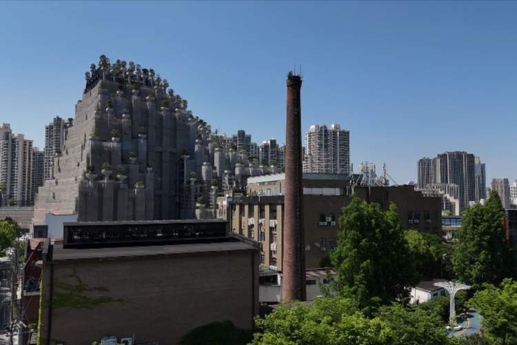 非遗项目展陈,"新生"的烟囱m50创意园的制高点,高度约40米的全砖烟囱