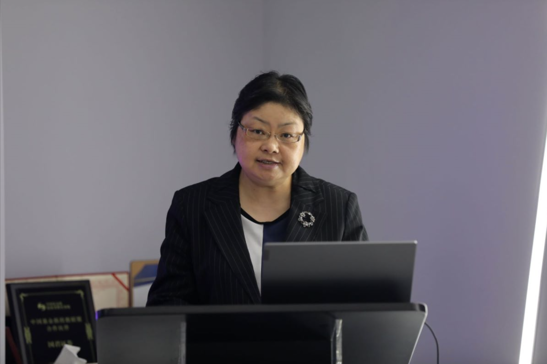 68686868图为国泰君安证券合规总监张志红在活动上发言.