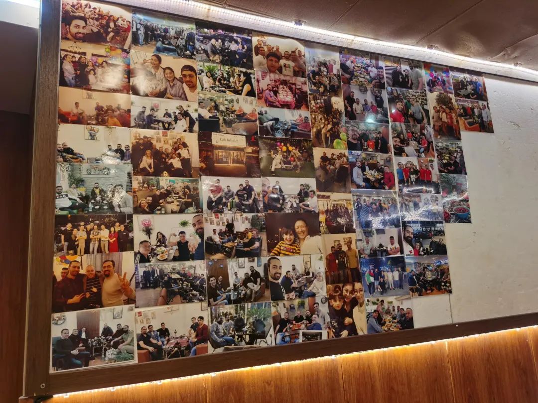 国际餐厅的照片墙。记者 付玲莉 摄