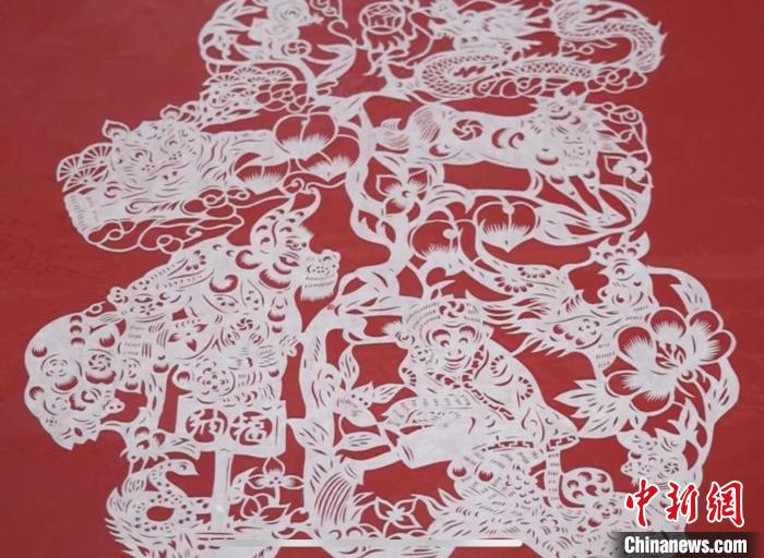 浙江听障小伙:有形的剪纸"演绎"无声的世界