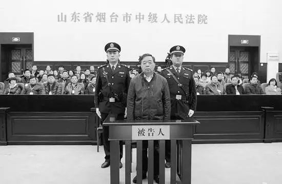 (季建业庭审现场，图源新华社)