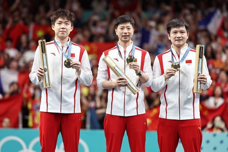 中国乒乓球男子团体赛实现五连冠。图源新华社