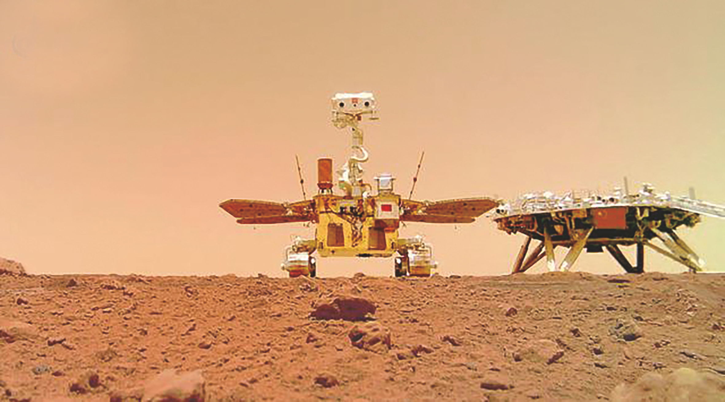 中国的"天问一号"着陆火星乌托邦平原,图为"祝融号"火星车与着陆器