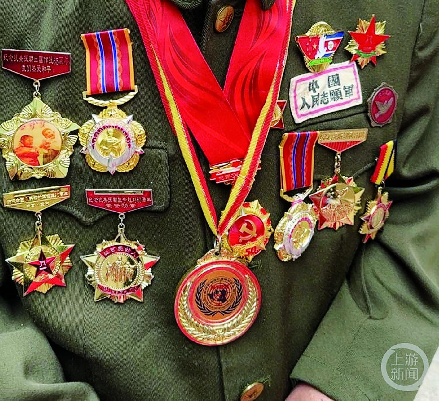 粟远奎(中)10月25日是中国人民志愿军抗美援朝出国作战74周年纪念日