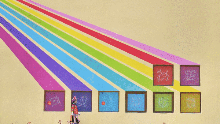 七彩图案融合进了威远镇的街巷楼宇（央广网记者  贾海元  摄）