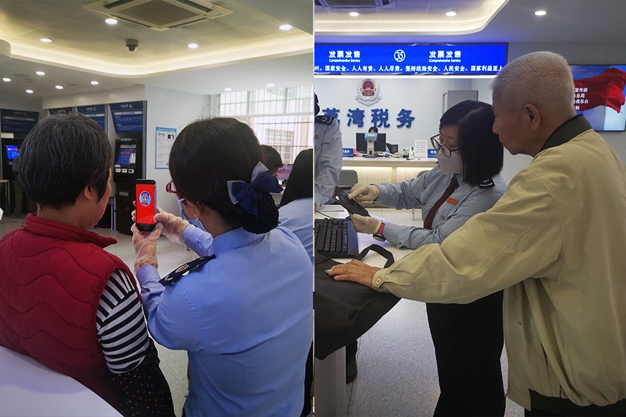 　　税务人员在引导老年人群众数字化办税。新华网卢鉴摄