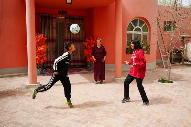 Young girl practicing ball dribbling skills