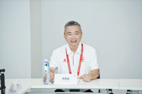 （广东省足球协会主席谢昌晶）