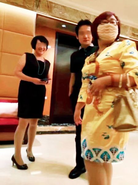 右一戴口罩者为钱志敏（贵寓图片）