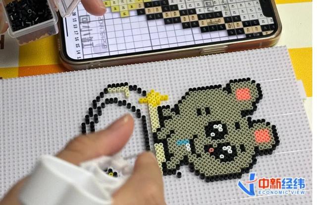 消费者在拼豆 中新经纬 王玉玲摄