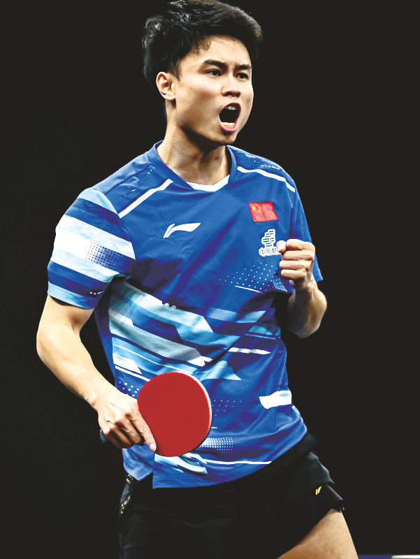     1月18日，周启豪在比赛中庆祝得分。新华社发