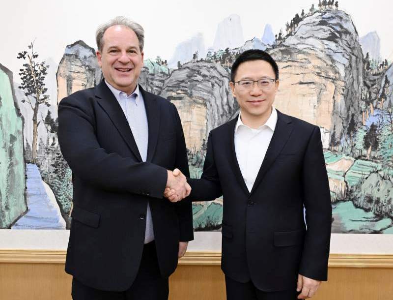 廖岷会见美中贸委会会长谭森