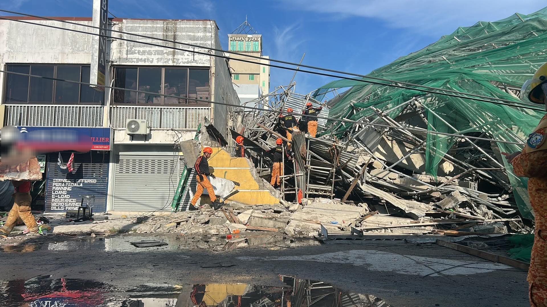 菲律宾一在建酒店坍塌 数十名建筑工人被困