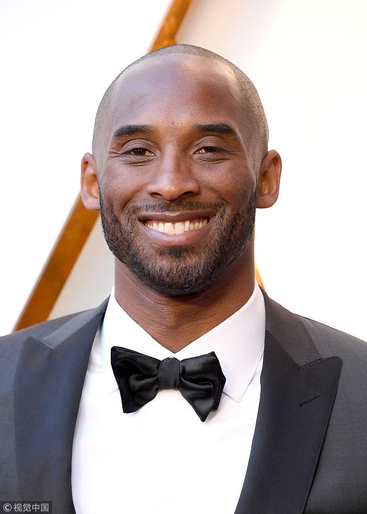 科比携妻亮相奥斯卡颁奖礼