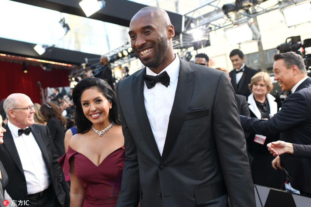 科比携妻亮相奥斯卡颁奖礼