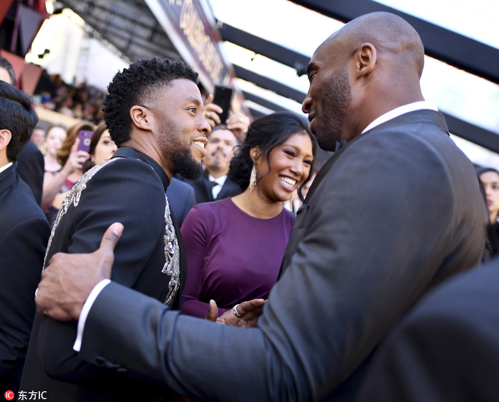 科比携妻亮相奥斯卡颁奖礼