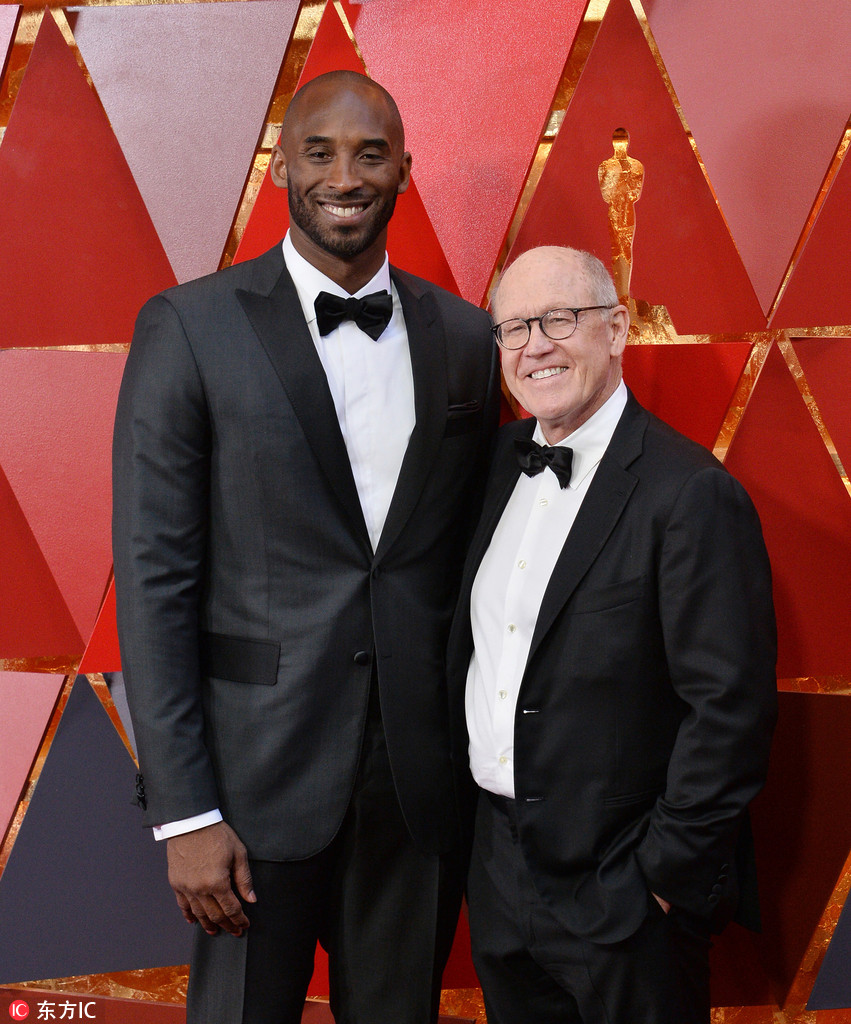 科比携妻亮相奥斯卡颁奖礼