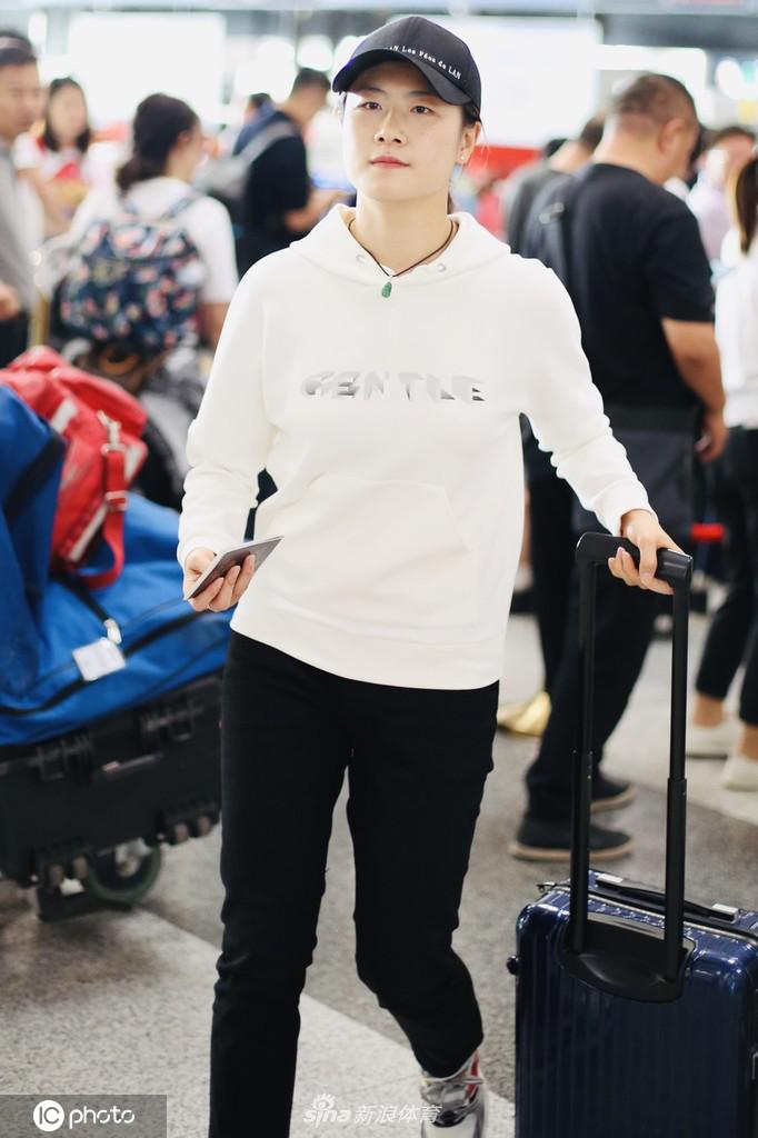 丁宁由瑞典返回北京