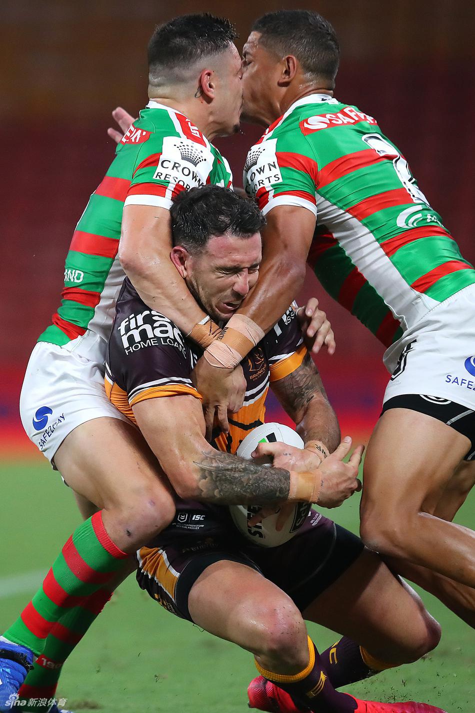 australia - march 20: darius boyd of the broncos is tackled