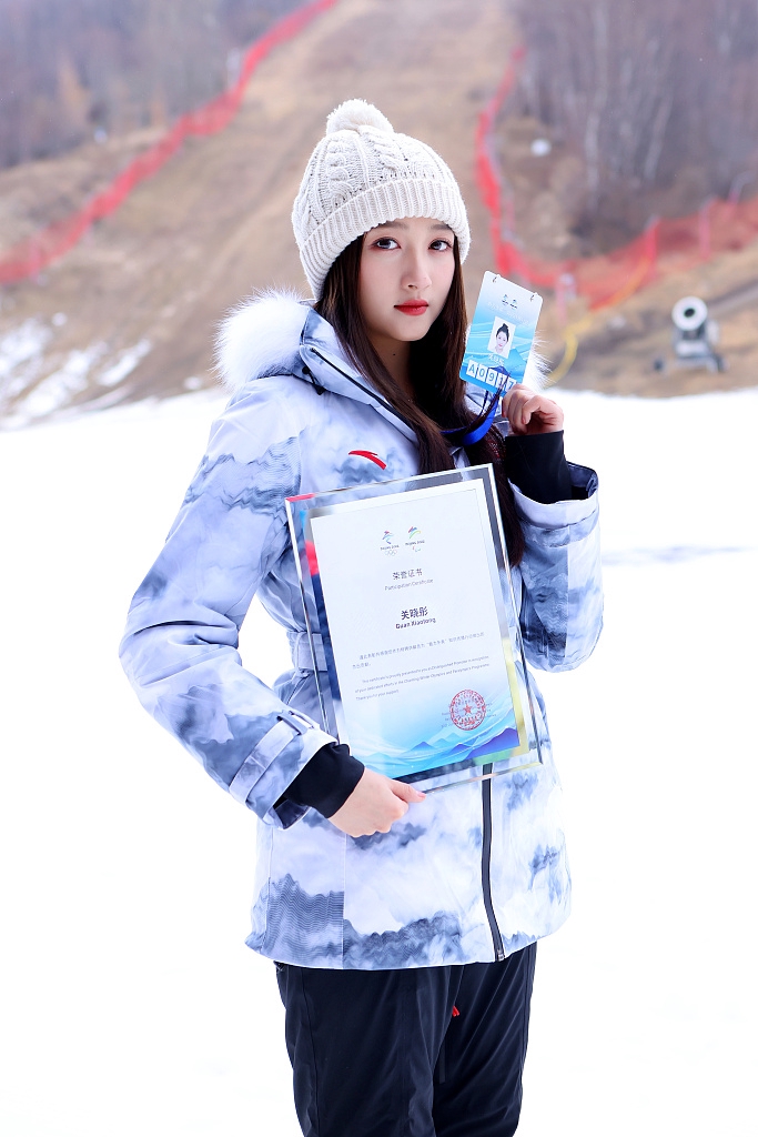 关晓彤任冬奥会助力大使 携手王餮┏∨男凑