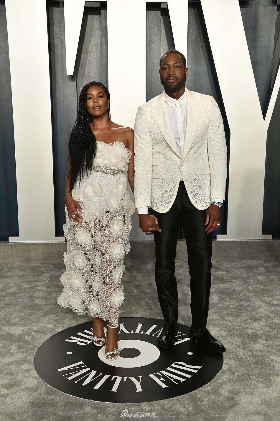 韦德携尤尼恩现身名利场派对