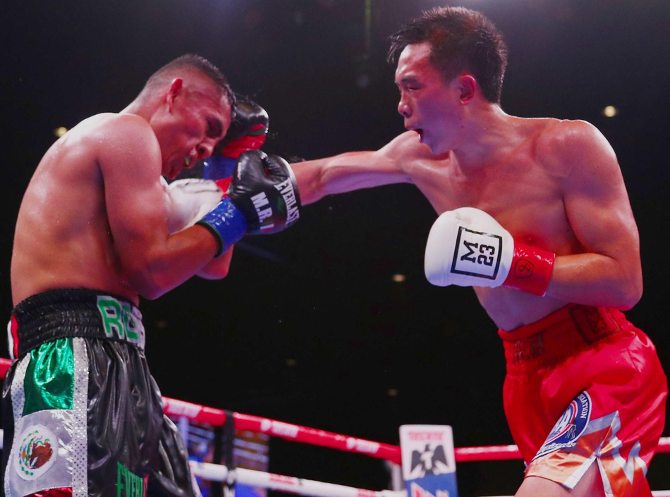 徐灿客场卫冕拳王金腰带