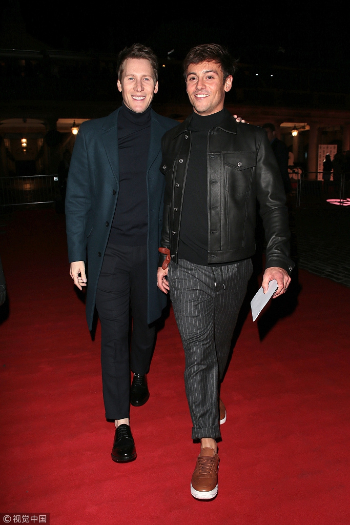 跳水金童戴利与丈夫出席活动