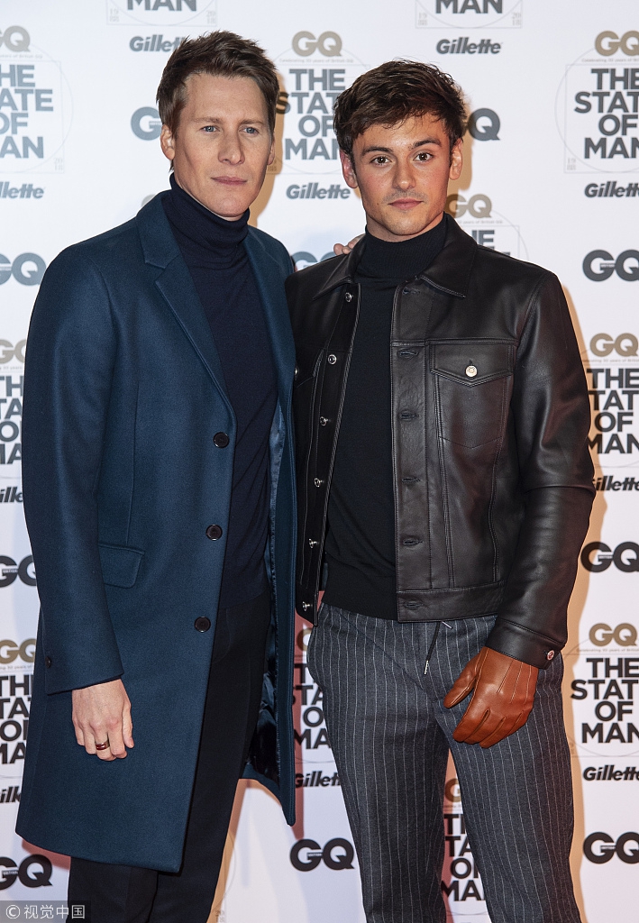 跳水金童戴利与丈夫出席活动