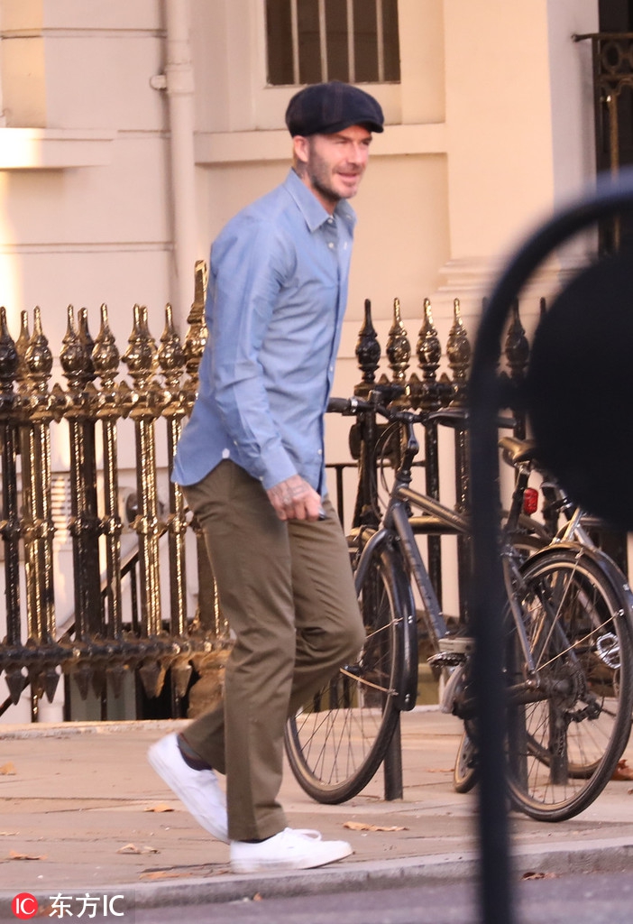 贝克汉姆英伦风搭配笑容满面