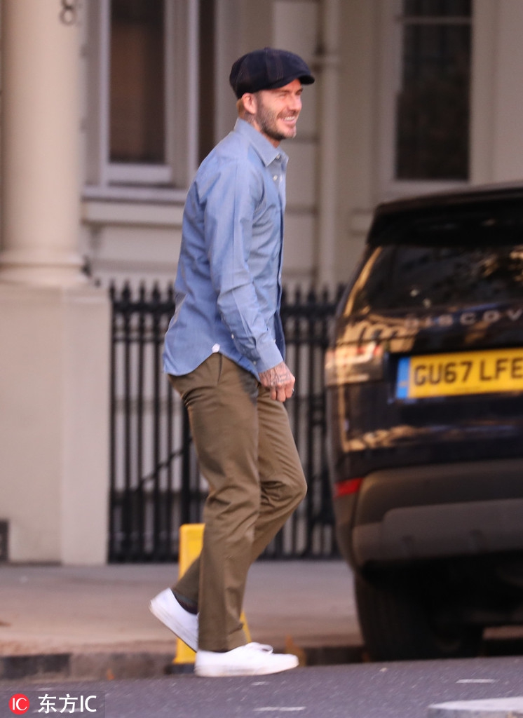 贝克汉姆英伦风搭配笑容满面